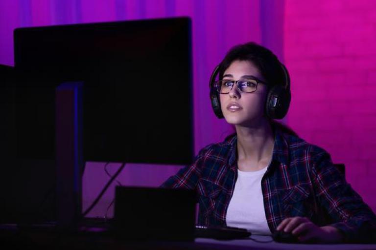 woman working large screen