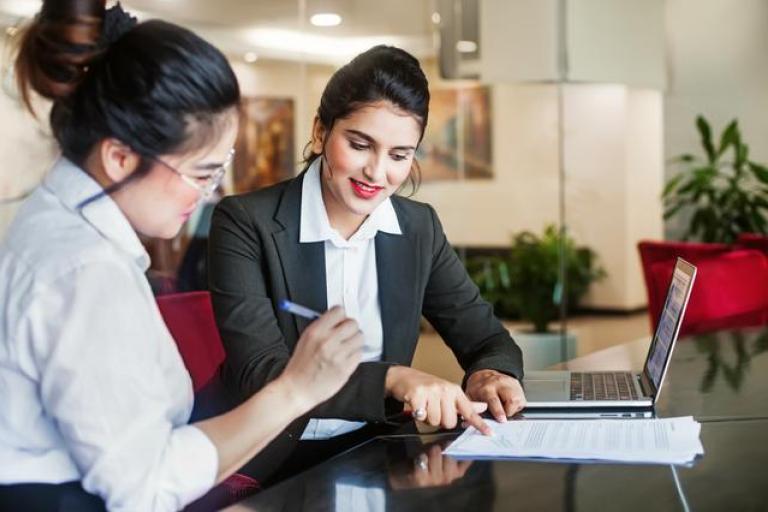 image showing Multigenerational banking personalization among two women